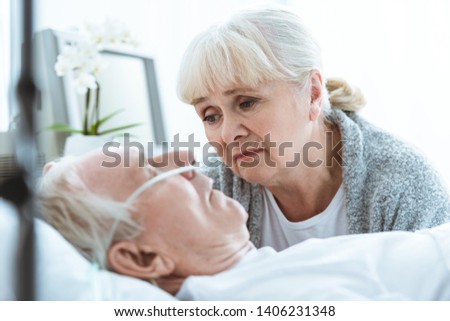 Similar – Female doctor comforting older female patient