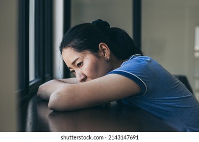 sad serious illness woman.depressed emotion panic attacks alone sick people fear stressful crying.stop abusing domestic violence,help person with health anxiety,thinking bad frustrated exhausted - Shutterstock ID 2143147691