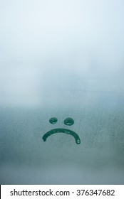 Sad Smile Inscription On The Foggy Glass Background