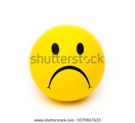 Sad smile on white background
