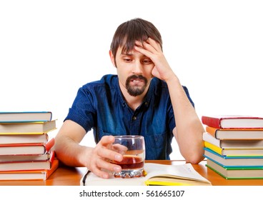 Sad Student with Alcohol on the Desk Isolated on the White Background