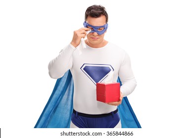 Sad Superhero Holding A Box Of Wipes And Crying Isolated On White Background