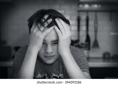 
Sad teenage boy. Black and white photo - Shutterstock ID 394393186