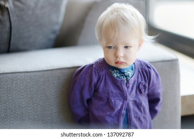 Sad Toddler Girl Portrait Indoors