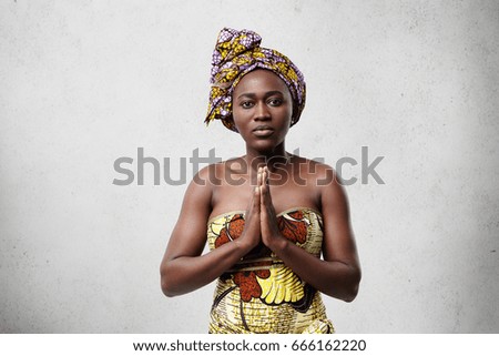 Similar – Image, Stock Photo A girl, worried about her figure, measures the circumference of her waist with a tape measure