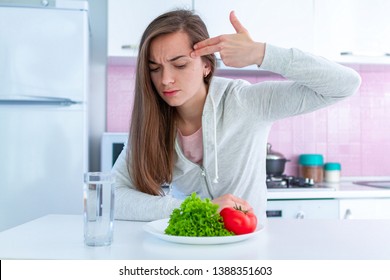 Sad Unhappy Woman Is Tired Of Dieting, Exterminate Yourself With A Diet And Forcing Yourself To Eat Organic, Clean Healthy Food