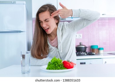 Sad Unhappy Woman Is Tired Of Dieting, Exterminate Yourself With A Diet And Forcing Yourself To Eat Organic, Clean Healthy Food