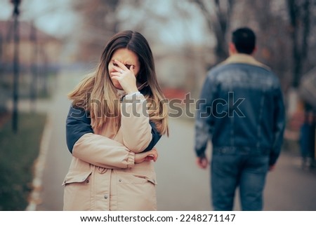 
Sad Upset Woman Crying After a Painful Break-up. Man leaving his girlfriend after split-up last date
