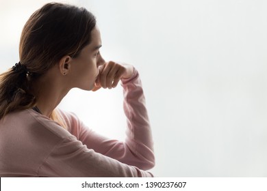 Sad Woman Close Up Side View Pose Aside Copy Space For Text, Girl Holds Hand Near Mouth Indecision Posture, Feels Uncertain Nervous Difficult To Make Decision, Unwanted Pregnancy And Abortion Concept