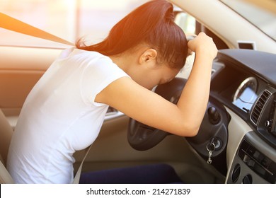 sad woman driver in car 