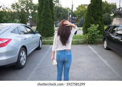 Sad Woman With Empty Parking Space
