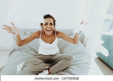 Sad Woman With Flowed Mascara Crying On The Bed. Paper Napkins. Unhappy Holiday. Sad Weekend. Tears On The Face. Disappointed Girl. Female In The Bad Mood. Alone In The Bedroom. Spoiled Makeup. - Shutterstock ID 1197585838
