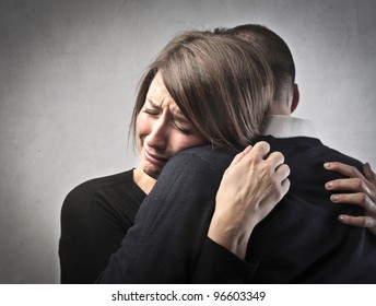Sad Woman Hugging Her Husband
