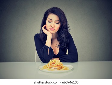 Sad Woman On Diet Craving For Fast Food 