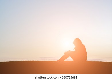 Sad Woman Silhouette Sit Alone In The Grass So Lonely