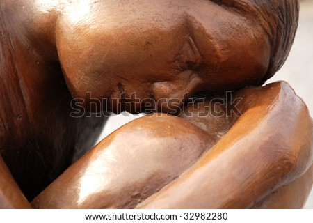 sad woman statue