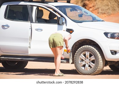 Sad Woman Waiting For Help To Change Her Car Flat Tire