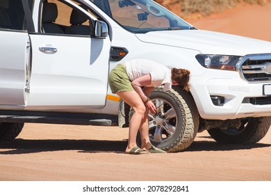 Sad Woman Waiting For Help To Change Her Car Flat Tire