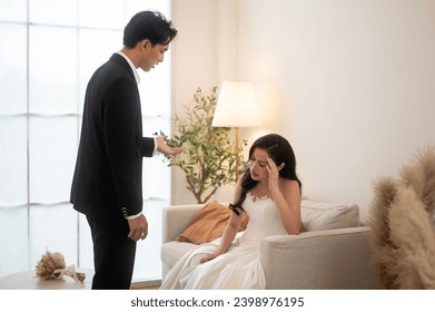 Sad and worried bride crying and arguing with groom in wedding day - Powered by Shutterstock