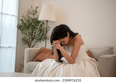 Sad and worried bride crying and arguing with groom in wedding day - Powered by Shutterstock