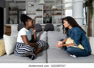 Sad Young Black Woman Feeling Negative Emotions Talking To Her Roommate And Friend. Young Girl In Trouble Feeling Sadness And Depressive. Depressed African American Girl With Bad Emotions And Feelings