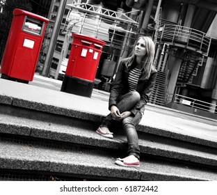 sad young girl in big city - Powered by Shutterstock