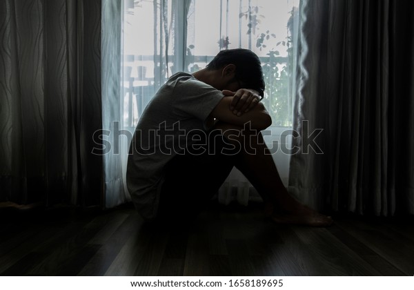 Sad Young Man Sitting On Bed Stock Photo 1658189695 | Shutterstock