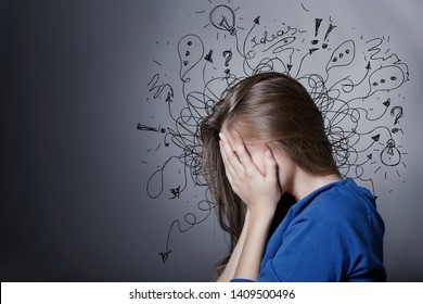 Sad young man with worried stressed face expression and brain melting into lines question marks. Obsessive compulsive, adhd, anxiety disorders concept - Shutterstock ID 1409500496