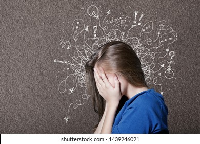 Sad young man with worried stressed face expression and brain melting into lines question marks. Obsessive compulsive, adhd, anxiety disorders concept - Shutterstock ID 1439246021