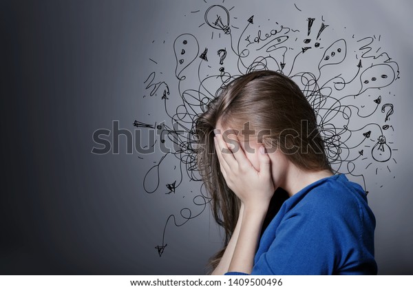 Sad young man with worried stressed\
face expression and brain melting into lines question marks.\
Obsessive compulsive, adhd, anxiety disorders\
concept