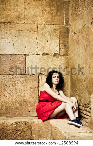 Similar – Melancholic girl with red dress in nature