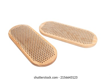 Sadhu board isolated on white background. The practice of standing on nails. Yoga concept.