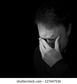 sadness, man crying black and white portrait with copy space