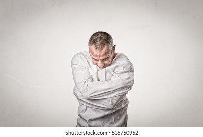 sadness situation for man with straitjacket, light background