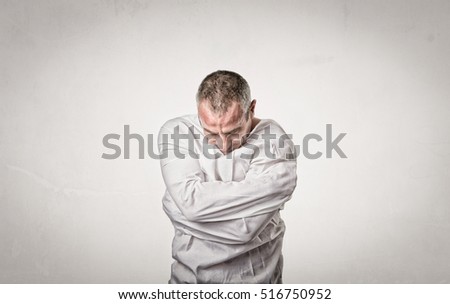sadness situation for man with straitjacket, light background