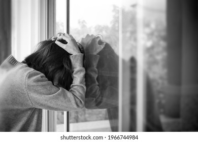 Sadness Woman With Glass Door At Home.Broken Heart. Black And White Image Of Woman Standing Sad Cry. She Disappointed, Strain, Regret From Lovers Problem Husband Her.unrequited In Love.