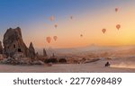 Safari trip ATV quad bike with set colorful hot air balloon in Cappadocia Goreme Turkey banner.