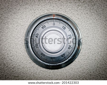 Safe dial lock close up background