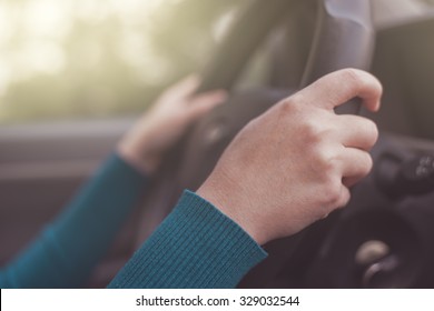 Safe Driving Strategy, Woman Properly Grips Car Steering Wheel, Road Safety, Selective Focus