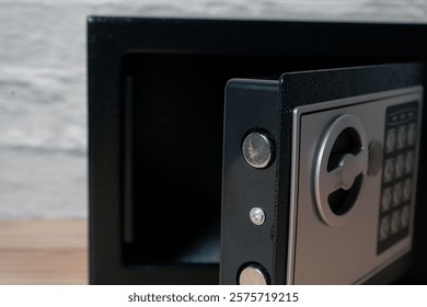 Safe or home security box with key and digital keypad.