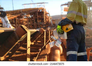 Safe Work Practise Miner Wearing Work Uniform Safety Glove Holding Hard Hat Danger Personal Safety Locks Preparing To Locking On Isolation Convertor Belt Prior Working On Site