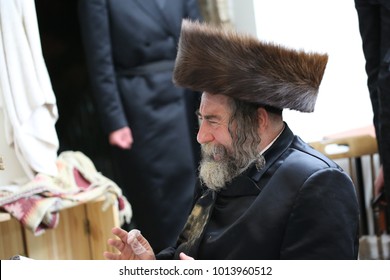 SAFED, ISRAEL - Apr. 22, 2017: The Grand Hasidic Rabbi, Rachmastrivka Rebbe, During A Festive Meal With His Hasidic Followers, In Safed, Israel