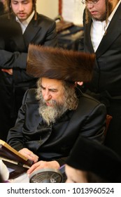 SAFED, ISRAEL - Apr. 22, 2017: The Grand Hasidic Rabbi, Rachmastrivka Rebbe, During A Festive Meal With His Hasidic Followers, In Safed, Israel