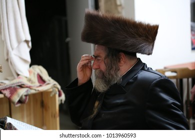 SAFED, ISRAEL - Apr. 22, 2017: The Grand Hasidic Rabbi, Rachmastrivka Rebbe, During A Festive Meal With His Hasidic Followers, In Safed, Israel