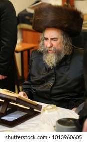 SAFED, ISRAEL - Apr. 22, 2017: The Grand Hasidic Rabbi, Rachmastrivka Rebbe, During A Festive Meal With His Hasidic Followers, In Safed, Israel