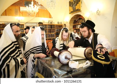 SAFED, ISRAEL - Nov 30, 2017: Rachmastrivka Rebbe Reads From The Torah Scroll And Prays The Morning Prayer Of Shacharit In A Synagogue In Safed/Tzfat