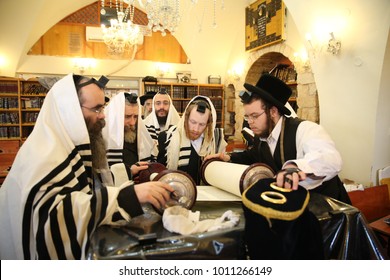 SAFED, ISRAEL - Nov 30, 2017: Rachmastrivka Rebbe Reads From The Torah Scroll And Prays The Morning Prayer Of Shacharit In A Synagogue In Safed/Tzfat