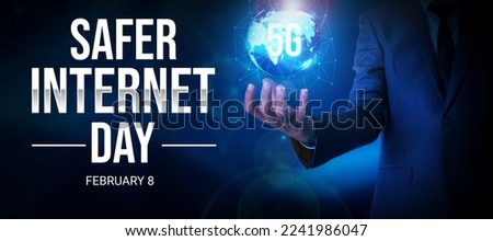 Safer Internet Day Wallpaper with a glowing globe in the hand of a businessman. Internet day backdrop