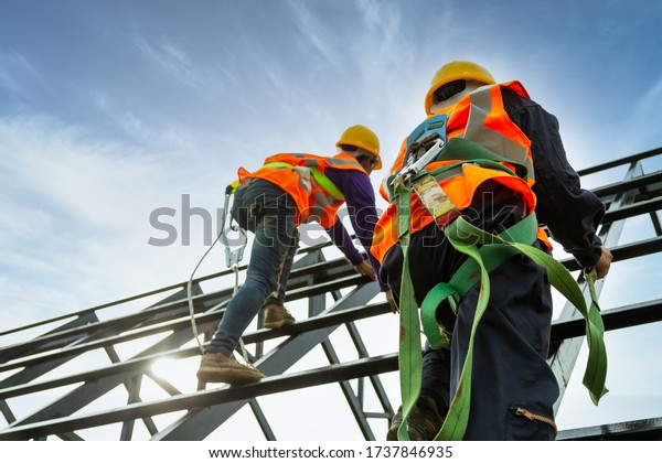 Safety body construction, Working at height\
equipment. Fall arrestor device for worker with hooks for safety\
body harness on the roof\
structure