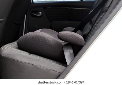 Safety Booster Seat For Children. Car Interior.